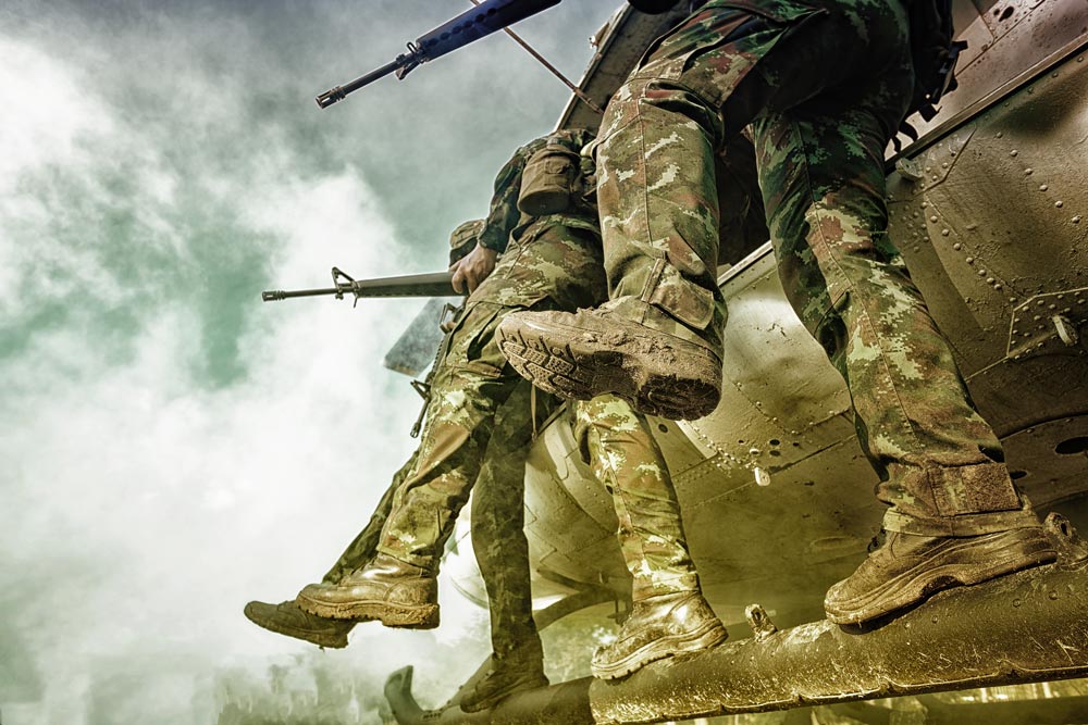 low angle shot of military personnel wearing boots